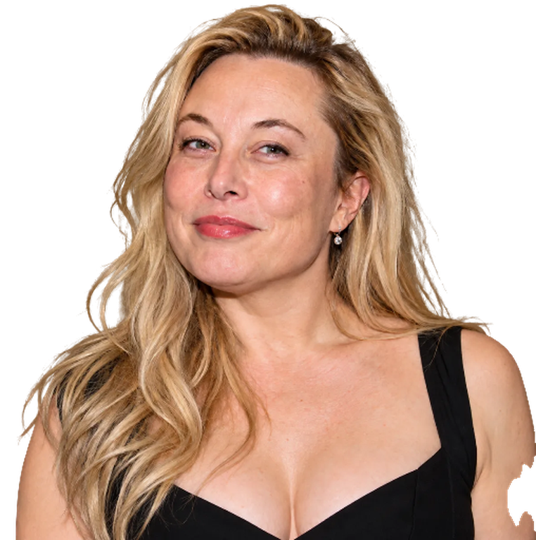 Elona Musk, blonde waves and a black dress, smiling